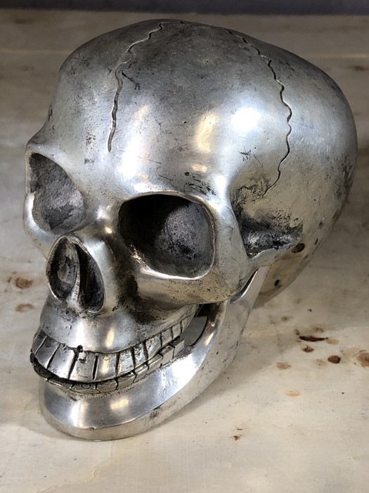 Ornamental white metal skull, approx 10cm in height