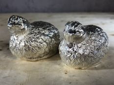 Pair of silver coloured heavy metal bird salt and pepper shakers, approx 5cm in height