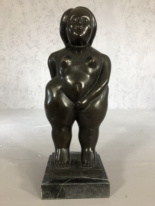 Large bronze figure of a rotund woman, approx 36cm in height