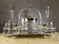 Silver plate and glass decanter and biscuit box set, decanters approx 26cm in height