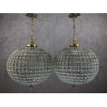 Pair of medium ball shaped chandeliers with beaded design, drop approx 50cm