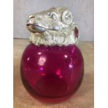 Pink glass jug with ram's head lid, approx 19cm in height