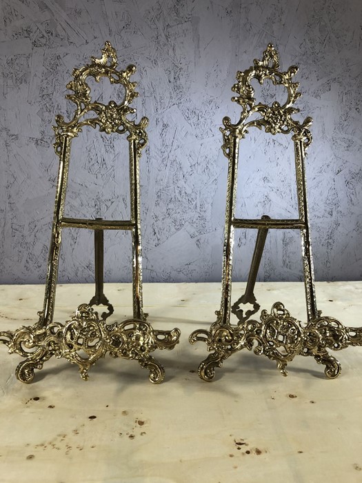 Pair of easels in gold finish, each approx 41cm in height