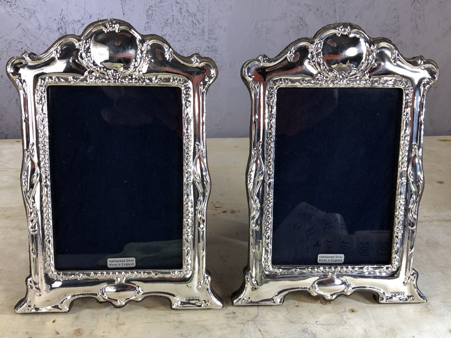 Pair of silver photo frames, approx 21cm x 15cm