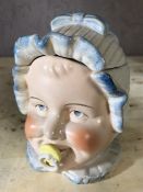 Porcelain box in the form of a baby's head, approx 14cm in height