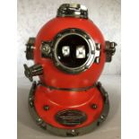 Red decorative reproduction divers helmet, marked 'US Navy Diving Helmet', approx 40cm in height