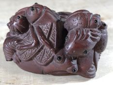 Japanese wooden netsuke with insect design, approx 5cm in length