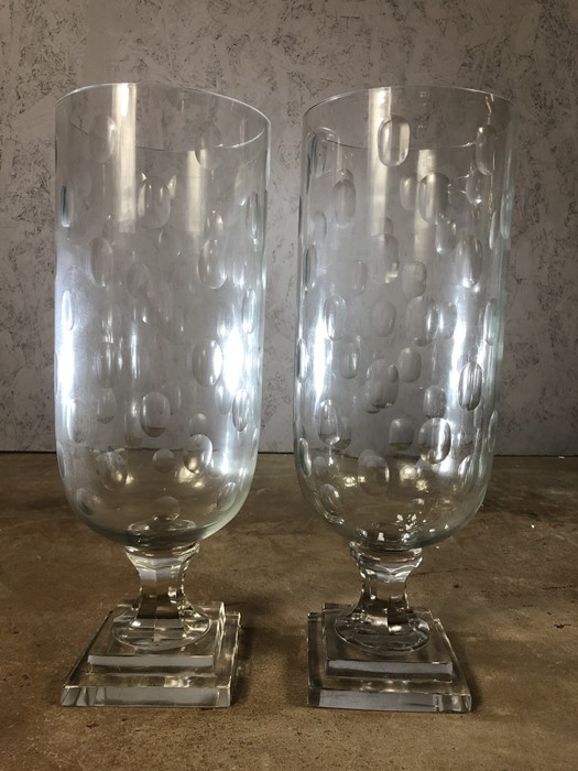 Pair of large glass hurricane lamps, each approx 40cm in height