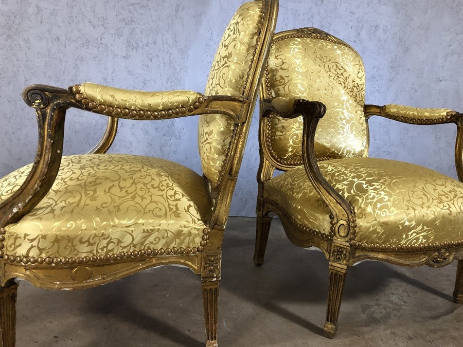 Five piece suite to include two seater sofa and four armchairs with wood and gilt frames and gold - Image 10 of 12