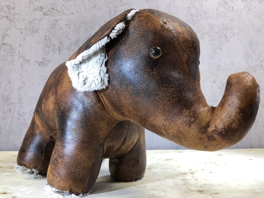 Leather doorstop in the form of an elephant, approx 26cm in height