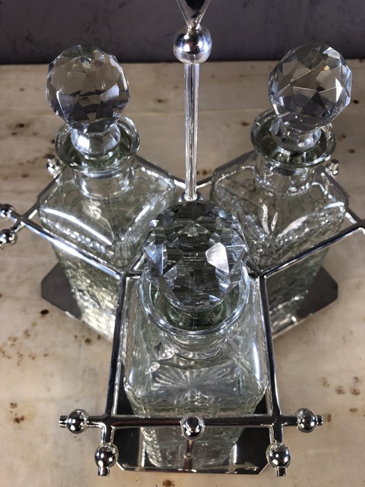 Dresser style silver plated three decanter tantalus, decanters approx 23cm in height - Image 3 of 5