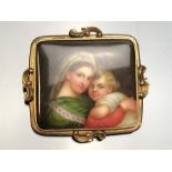Russian Brooch hand painted on Porcelain of mother and child in Gold coloured (probaly 9ct) frame
