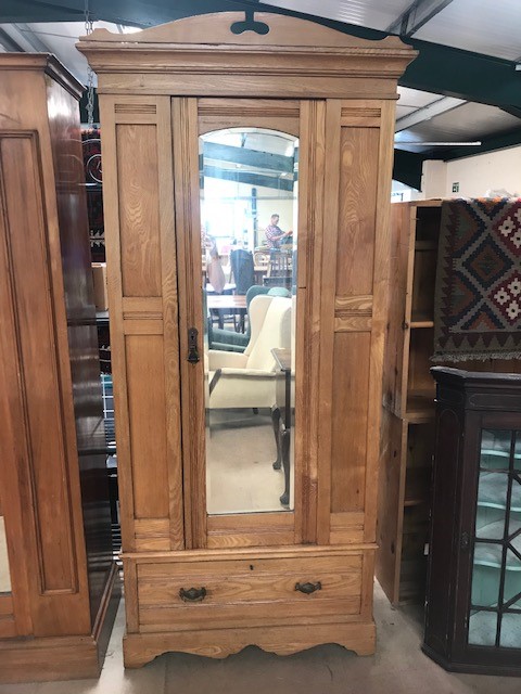 Single pine wardrobe with carved detailing, central mirror and drawer to base, approx 84cm x 40cm