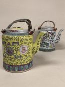 Pair of Chinese lidded tea pots with cane handles and floral or dragon design, each approx 15cm to