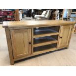 Small oak sideboard/TV unit with three drawers and two cupboards