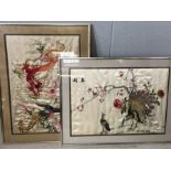 Two Chinese hand embroidered framed silks depicting dragons and peacocks each approx 62cm x 47cm