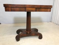 Walnut veneered card table on pedestal base with green baize, approx 92cm x 45cm x 72cm tall (