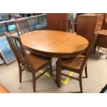 Mid Century oval extending dining room table by William Lawrence of Nottingham, with four chairs,