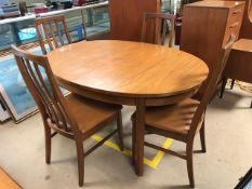 Mid Century oval extending dining room table by William Lawrence of Nottingham, with four chairs,