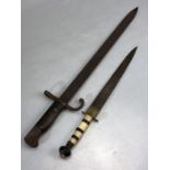 WWI German Bayonet and a wooden and bone handled Eastern daggger