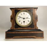 19th Century French mantel clock with enamel dial, in working order, approx 21cm in height