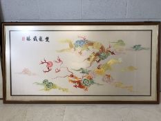 Large framed Chinese silk embroidery on ivory silk depicting dragons, approx 164cm x 83cm