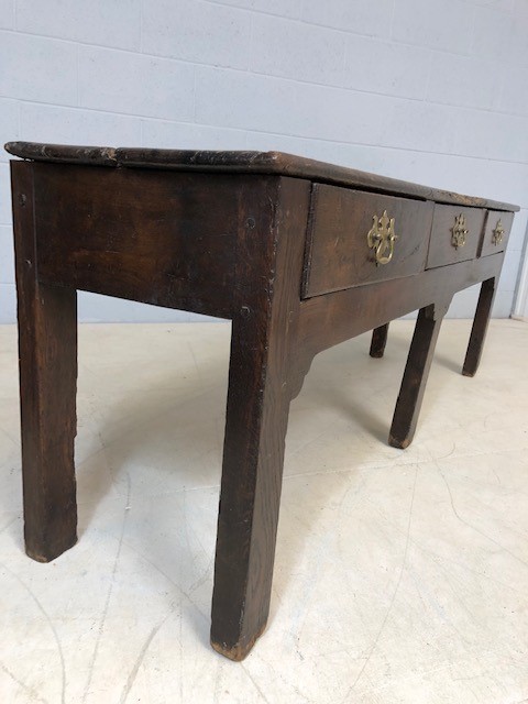 18th Century low oak console / table with three drawers and brass handles, approx 170cm x 40cm x - Image 3 of 5