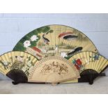 Collection of four Chinese oriental fans, three hand painted, one depicting koi Carp in a lotus