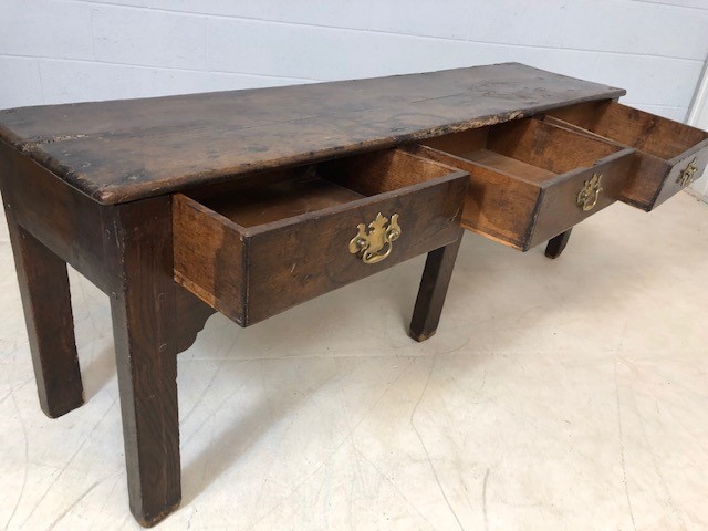 18th Century low oak console / table with three drawers and brass handles, approx 170cm x 40cm x - Image 5 of 5