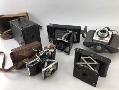 Collection of five vintage Kodak cameras to include: Eastman Rochester, New York vest pocket