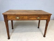 Large Victorian oak school desk with brass cup handles and ink well holders, approx 122cm x 68cm x