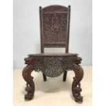 Vintage Burmese solid teak heavily carved side chair, approx 119cm height at back