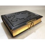 Victorian leather bound photo album with approx 65 photographs
