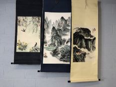 Collection of three Chinese Oriental ink and watercolour painted scrolls depicting mountainous
