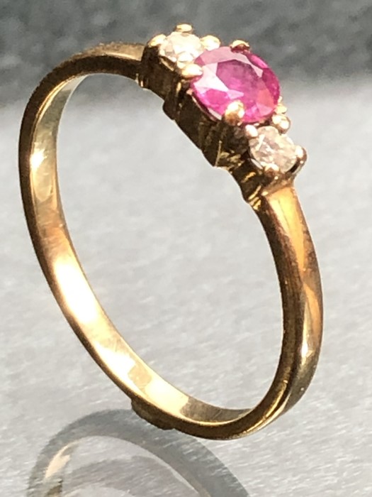 9ct Gold ring set with a single ruby and with Diamond shoulders size M - Image 2 of 3