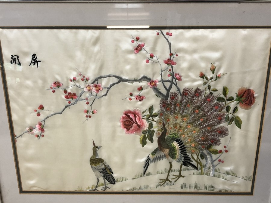 Two Chinese hand embroidered framed silks depicting dragons and peacocks each approx 62cm x 47cm - Image 2 of 5