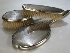 Silver Hallmarked dressing table set of two brushes and a handheld mirror