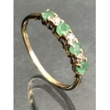 Emerald and diamond half Eternity ring set with four Emeralds and three diamonds on 9ct Gold