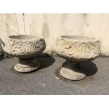 Two concrete planters approx 40cm tall