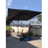 Large modern cantilever garden parasol and base, approx 3m square