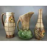 Two items of Bursley Ware Charlotte Rhead ceramics: a jug approx 23cm in height and a vase approx
