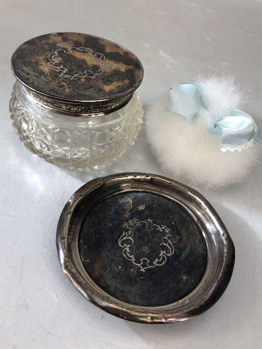 A glass Hallmarked silver and tortoise shell dressing table pot and a hallmarked silver and tortoise