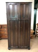 Dark wood two door wardrobe