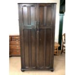 Dark wood two door wardrobe