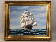 Oil on board of a sailing ship in full sail, approx 49cm x 39cm, gilt frame