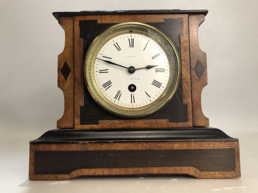 19th Century French mantel clock with enamel dial, in working order, approx 21cm in height