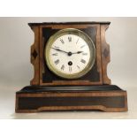 19th Century French mantel clock with enamel dial, in working order, approx 21cm in height