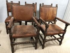 Set of four leather upholstered and studded gothic / mediaeval style banqueting chairs on heavy