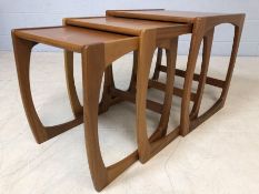 Nest of three Mid Century teak coffee tables