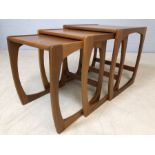 Nest of three Mid Century teak coffee tables